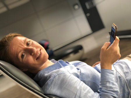 Traveling business man relaxing in a VIP lounge at the airport