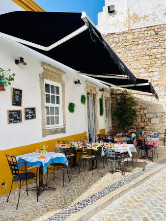 View of historical street in the old town Faro, Algarve, Portugal.のeditorial素材