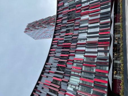 a very tall building with a lot of windows and a very colorful facadeのeditorial素材