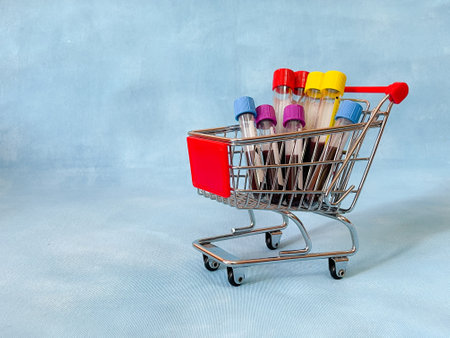 Some glasses vacutainer with blood analysis in a shopping basket.の写真素材