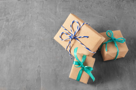 gift boxes on a background of gray wallの写真素材
