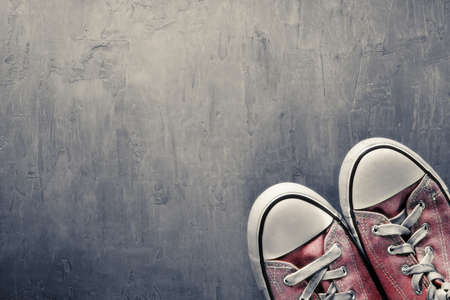 Two red sneaker on  clean concrete backgroundの写真素材