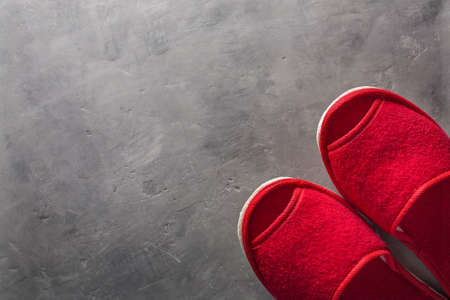 red slippers on the concrete floorの写真素材