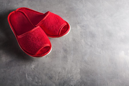 red slippers on the concrete floor
