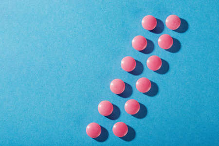 Medical pills of round shape and pink colorの写真素材
