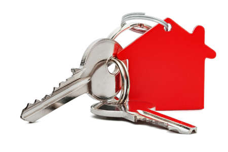 Estate concept, red key ring  and keys on isolated backgroundの写真素材