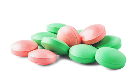 pile of medical pills on isolated white background. Pattern for design.の写真素材