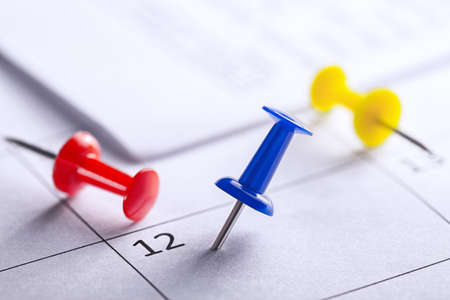 Important date and calendar appointment.Pins on calendar.の写真素材