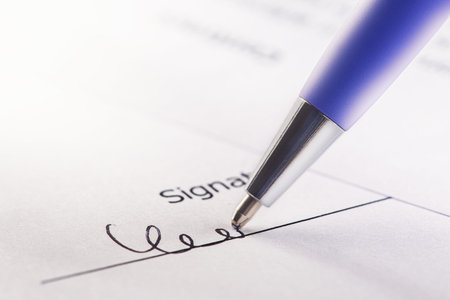 signature of contract and agreement, accounting document with pen. Concept of banking, financial...