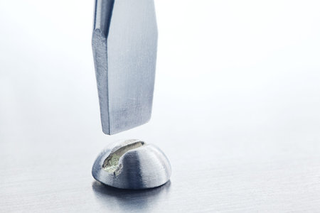 Screwdriver screw in metal steel plate bolt. Spanner, bolt, screw and nuts.