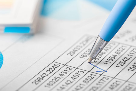 Accounting document with pen, color diagram and checking financial chart. Concept of banking,...