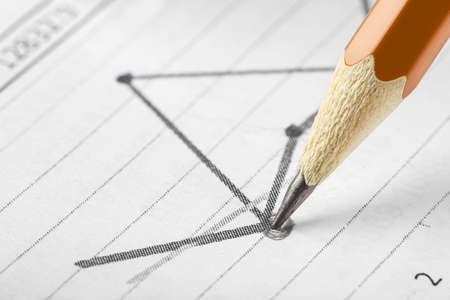 Accounting document with pencil and checking financial chart. Concept of banking, financial report and financial audit.の写真素材