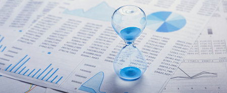 Best time for investment. Hourglass, financial charts and calculator.