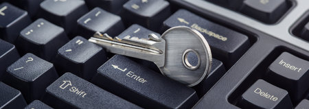 phishing, hacking personal data and money, key and hook on computer keyboard.