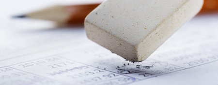 Fix with eraser financial data in document. Concept of banking, financial report and financial...