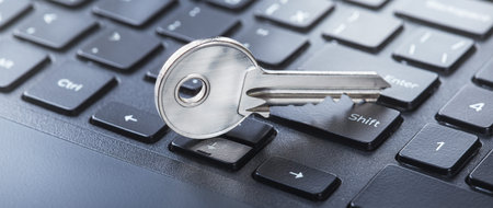 phishing, hacking personal data and money, key and hook on computer keyboard.