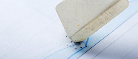 Fix with eraser financial data in document. Concept of banking, financial report and financial...