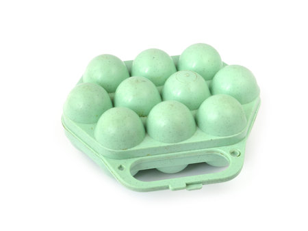 green container for egg on white background
