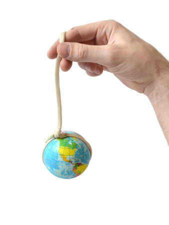 hand holding the globe on a rope