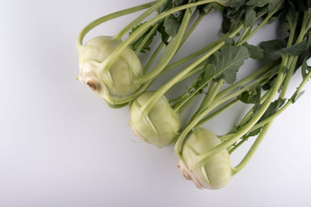fresh kohlrabi, close-up isolated on white background