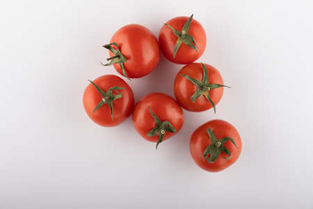 Ripe Fresh Cherry Tomatoes on Branch Isolated on White Backgroundの写真素材