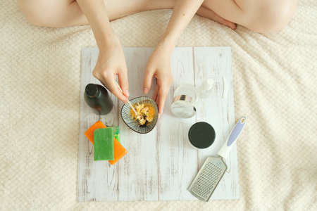 DIY cosmetics. hands in the frame create a cream of different ingredients.の写真素材