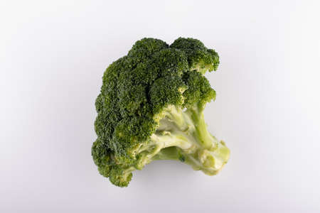 fresh broccoli close-up on a white backgroundの写真素材