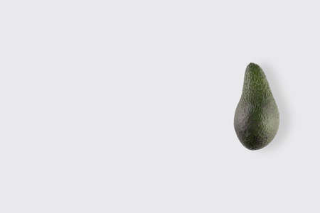 Brazilian green avocado close up in the right side of the white backgroundの写真素材
