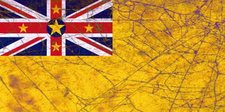 The flag of Niue was adopted on October 15, 1975. It consists of the Union Jack in the upper left corner with a star in the middle of the Union Jack and four stars forming a diamond around it. It is very unusual for a flag based on a British ensign designの写真素材