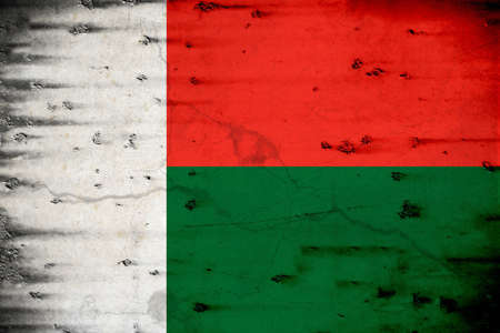 The flag of Madagascar was adopted on October 14, 1958, two years before the independence of that nation, as Madagascar prepared for a referendum on its status in the French Community.The colors of the flag represent Madagascar's history, yearning for indの写真素材