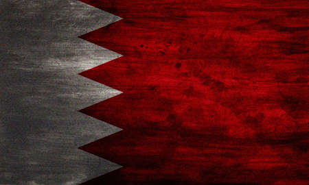 The national flag of Bahrain consists of a white band on the left, separated from a red area on the right by five triangles that serve as a serrated line.The five triangles symbolises the 5 pillars of Islam.It is sometimes mistaken for the flag of Qatar, の写真素材
