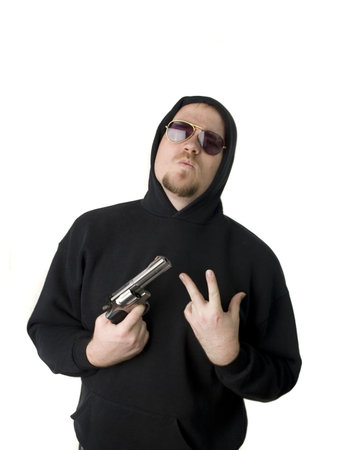 Criminal or Gangster with revolver and dark glasses