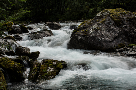 Mountain stream flowing in Norway, long exposureの写真素材