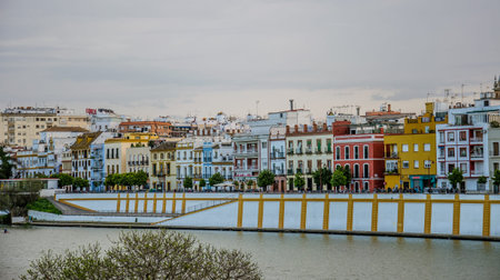 Seville, Spain - March 15 2017: Colorful buildings next to the Alfonso XIII channelのeditorial素材
