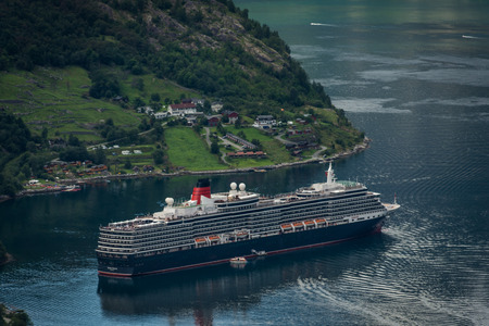 Geiranger, Norway - August 7 2018: Cruise ship leaving the Geiranger fjordのeditorial素材