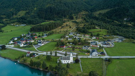 Aerial view of Oppstryn, a village in Norway, on the shore of Oppstrynsvatnet lakeの写真素材