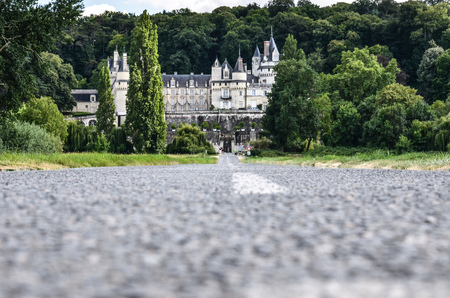 Asphalt road leading to ChÃ¢teau d'UssÃ© (Usse Castle), in the Loire river valleyのeditorial素材