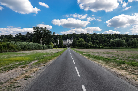 Straight road leading to ChÃ¢teau d'UssÃ© (Usse Castle), in the Loire river valleyのeditorial素材