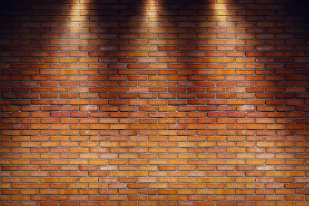 Empty grungy room with red brick wall and three spotlight raysの写真素材