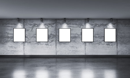 Modern concrete gallery room with directional spotlight and frames. Product artwork exhibition mock...