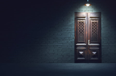 Mixed media illustration of dark evening street. Old fashioned wooden door in front of white brick...