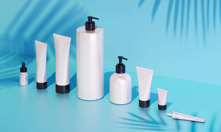 Trendy realistic mock up of cosmetics bottles and tubes on blue background. Modern bright still life bundle. 3d rendering template. Palm leaves shadows. Skin or hair care.の写真素材