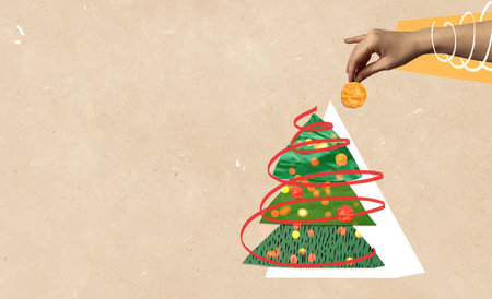 Greeting card in scrapbooking style. Human hand hanging an orange ball to Christmas tree from pieces of torn and crumbled textured paper. Minimalistic analog technique art.の写真素材