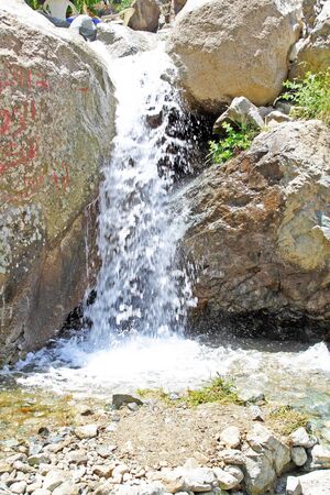 Beautiful waterfall in mountainsの写真素材