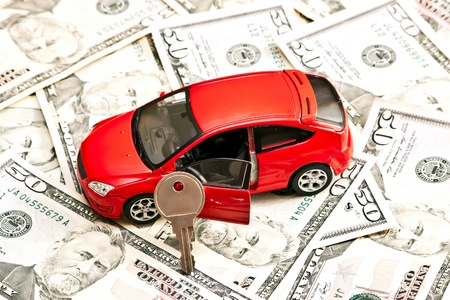 Car and money. Concept for buying, renting, insurance, fuel, service and repair costsの写真素材