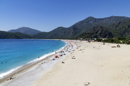 Tourists visit Oludeniz beach in Turkeyの写真素材