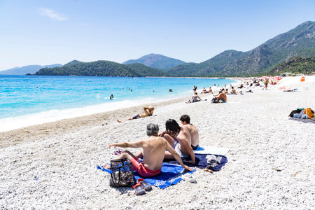 Tourists visit Oludeniz beach in Turkeyの写真素材
