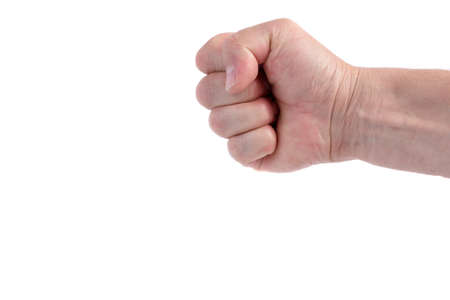 man's hand clenched into a fist on a white backgroundの写真素材