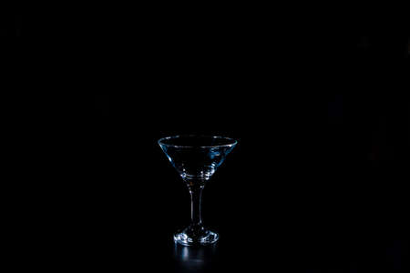 empty wine glass on a black backgroundの写真素材