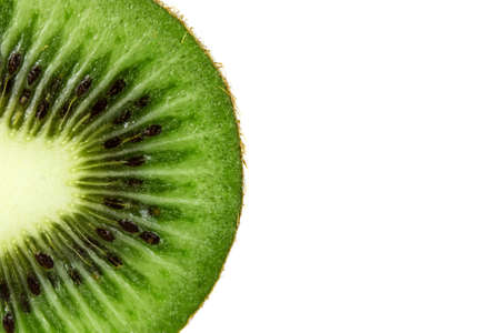juicy and delicious tropical fruit kiwi on a white backgroundの写真素材